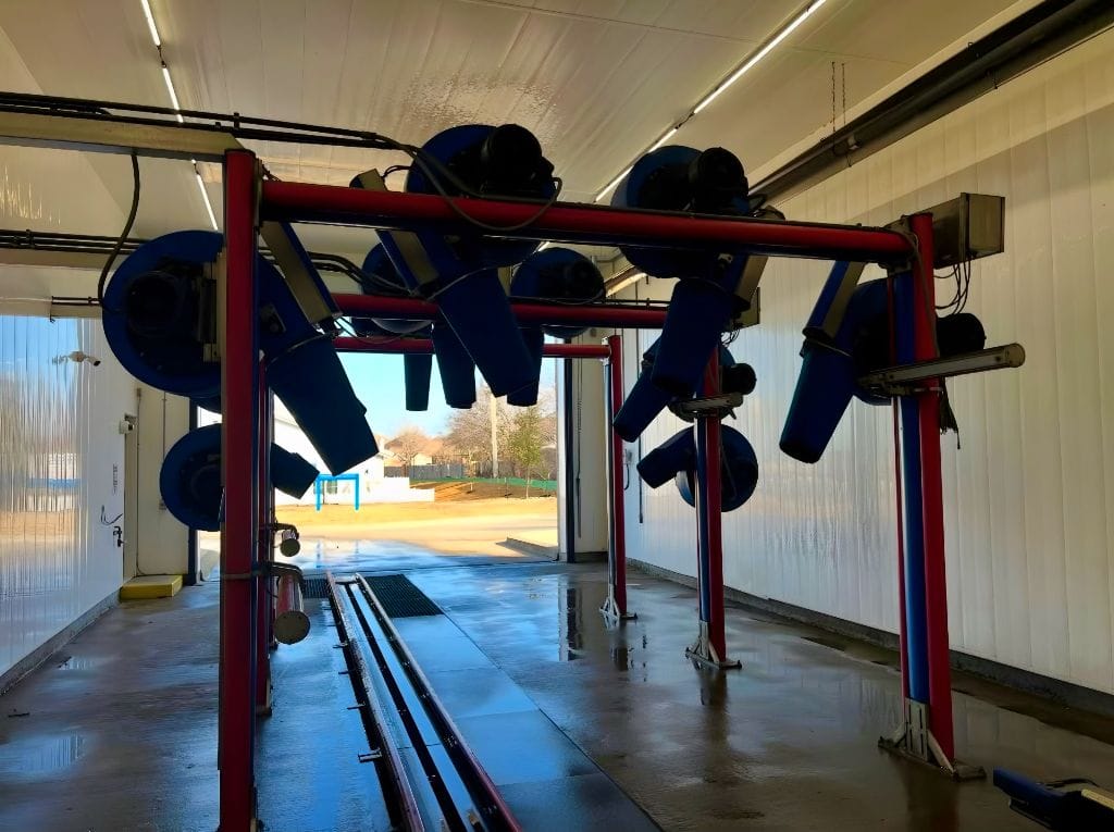 Brightworks Fort Worth exterior wash — high-powered blue blower units at the exit end of the exterior wash system